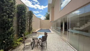 Casa de 4 suítes com home cine e piscina aquecida em condomínio fechado — miniatura 11