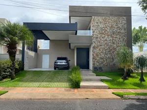 Sobrado de 4 suítes com piscina aquecida e espaço gourmet completo em condomínio tradicional — miniatura 2
