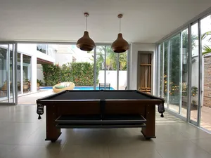 Sobrado de 4 suítes com piscina aquecida e espaço gourmet completo em condomínio tradicional — miniatura 22