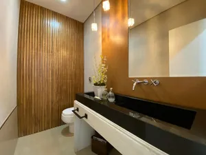 Sobrado de 4 suítes com piscina aquecida e espaço gourmet completo em condomínio tradicional — miniatura 26