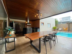Casa térrea com mezanino, piscina aquecida e 4 suítes em condomínio de alto padrão — miniatura 27