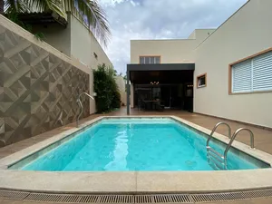 Casa térrea com mezanino, piscina aquecida e 4 suítes em condomínio de alto padrão — miniatura 29