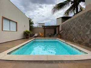 Casa térrea com mezanino, piscina aquecida e 4 suítes em condomínio de alto padrão — miniatura 30