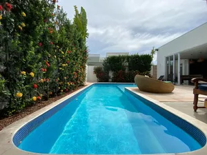 Sobrado de 4 suítes com piscina aquecida e espaço gourmet completo em condomínio tradicional — miniatura 32