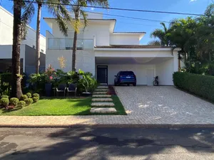 Sobrado de 4 suítes com piscina aquecida e home cinema em condomínio de alto padrão — miniatura 35