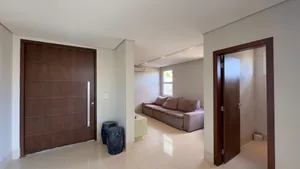 Casa de 4 suítes com home cine e piscina aquecida em condomínio fechado — miniatura 4