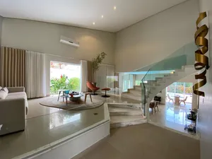 Sobrado de 4 suítes com piscina aquecida e espaço gourmet completo em condomínio tradicional — miniatura 4