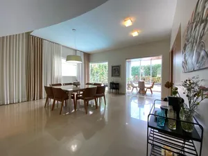 Sobrado de 4 suítes com piscina aquecida e espaço gourmet completo em condomínio tradicional — miniatura 7